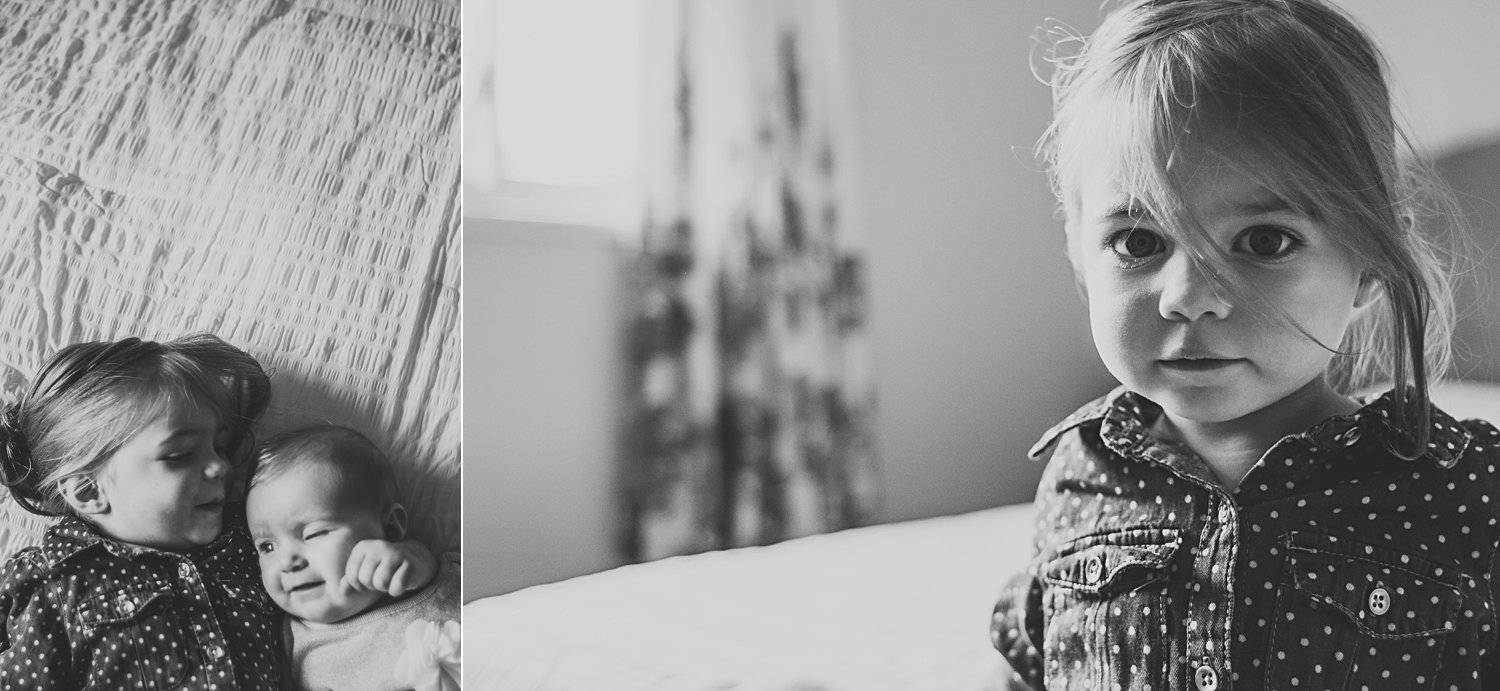 Young children laying on bed for family photos and young girl sitting on edge of bed