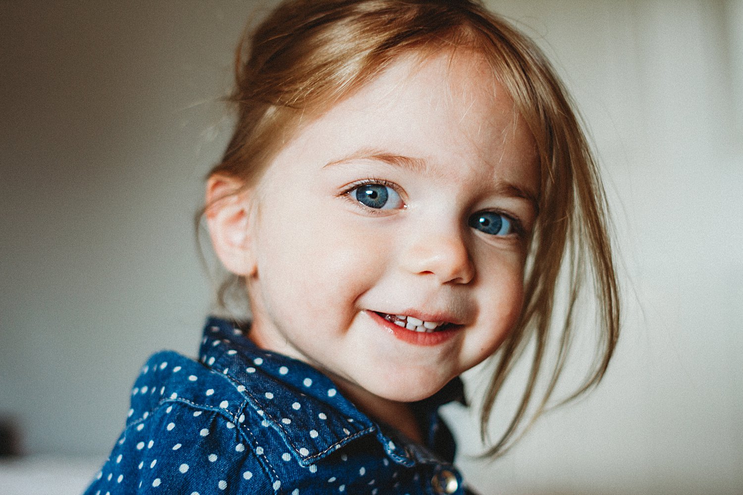 Portrait of young girl inside