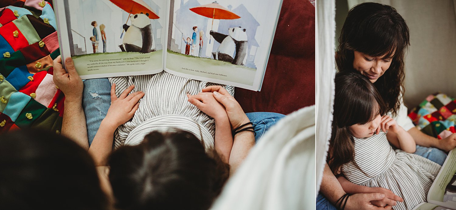 Mom and young daughter reading book together